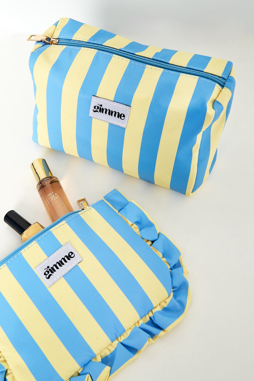 Trousse de maquillage rayée bleu et jaune