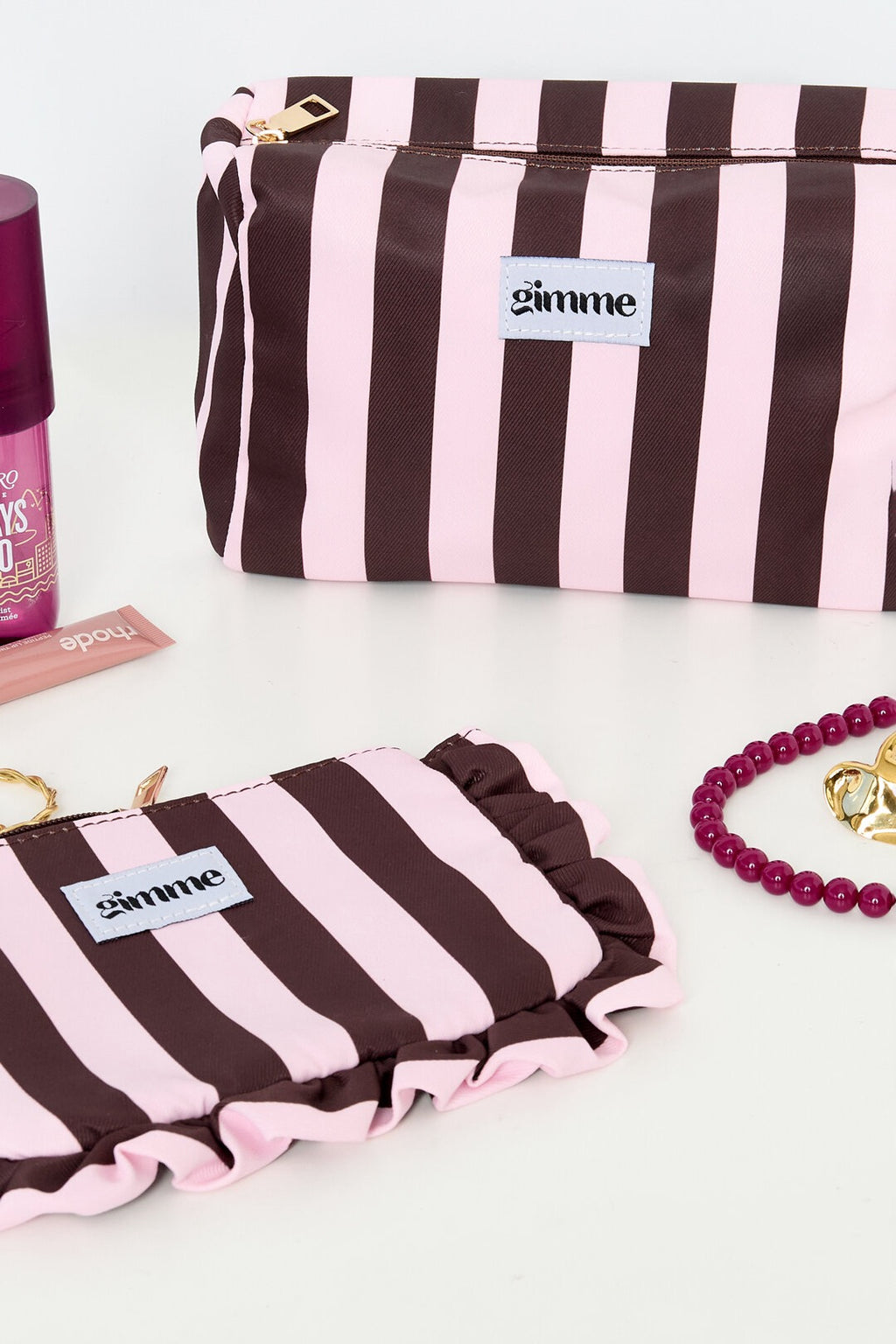 Trousse de maquillage rayée rose et marron